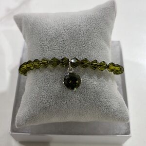 ✨ Unveil elegance with our Custom Luxury Olivine Czech Bracelet! ✨